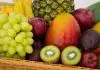 red apple fruit beside green apple and yellow fruit on brown woven basket