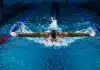 man doing butterfly stroke